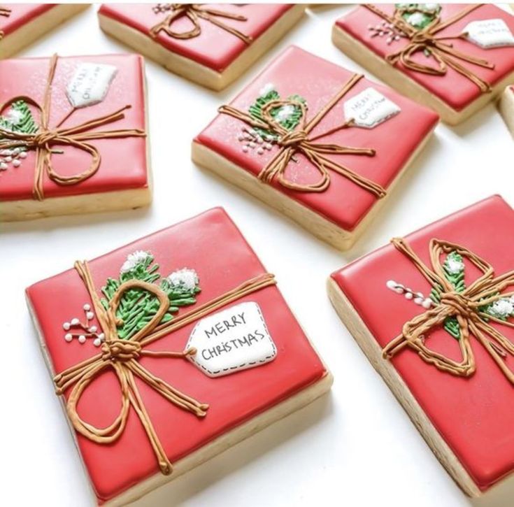 Festive Gift Box Cookies: Vibrant Red Icing & Floral Designs for Celebrations.