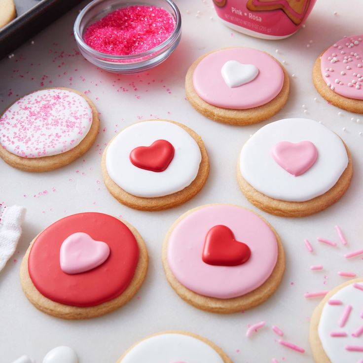 Playful Pastel Decorative Cookies with Heart-Shaped Accents and Sugary Sprinkles.