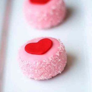 Charming Pink Confections with Heart Shapes: Festive Treats for Celebrations.