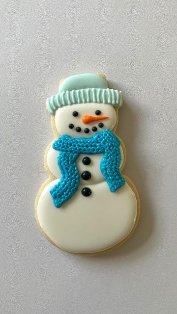 Cheerful Frosted Snowman Cookie: A Whimsical Winter Delight