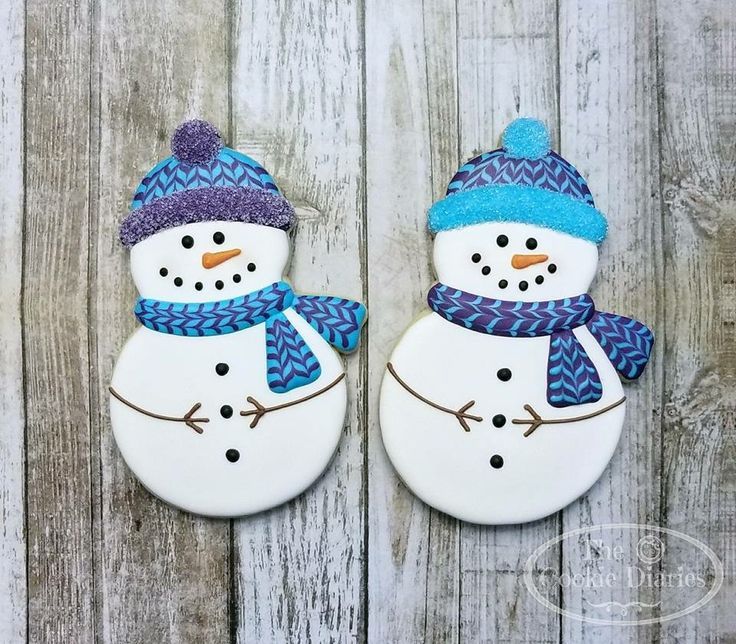 Festive Snowman Cookies Decorated with Colorful Hats and Scarves.