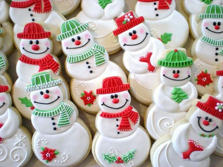 Whimsical Festive Snowman Cookies with Vibrant Designs Delight Holiday Celebrations.