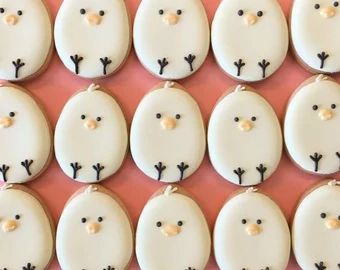 Charming Spring-Themed Cookie Designs with Cute Chick and Egg Motifs in Soft Pastel Colors.