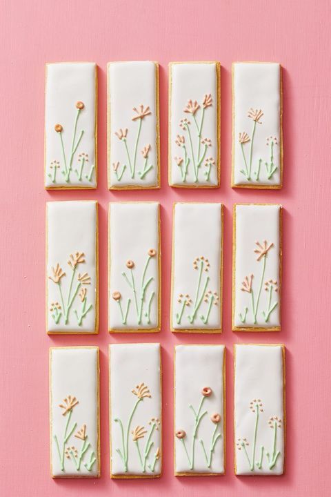 Charming Floral-Inspired Rectangular Cookies with Whimsical Icing Designs.