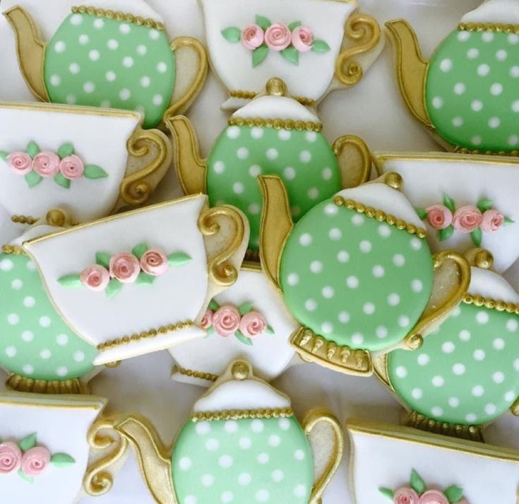 Whimsical Tea-Themed Cookies with Delicate Designs and Elegant Accents.