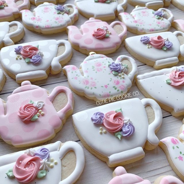 Charming Floral Tea Kettle Cookies in Pastel Designs Perfect for Gatherings.