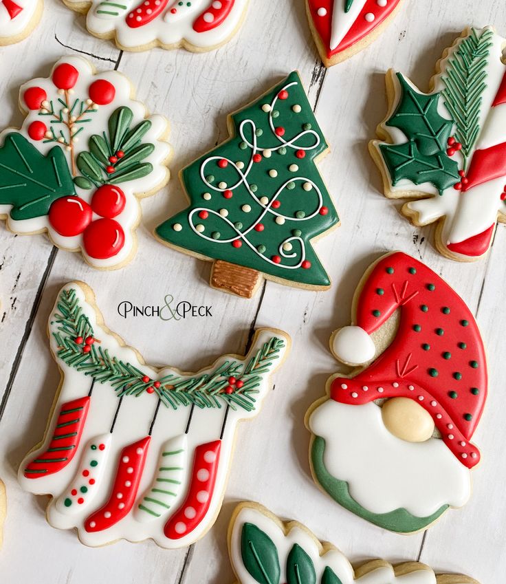 Holiday-Themed Festive Cookie Decorations Featuring a Christmas Tree, Stockings, and Santa Face.