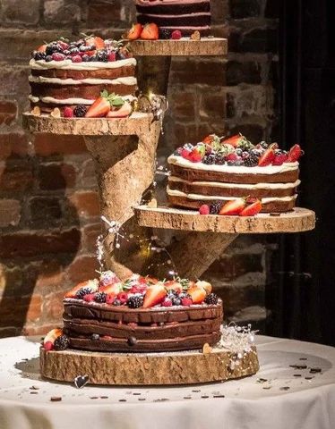 Charming Multi-Layer Chocolate Cake Display with Fresh Berries for Celebrations