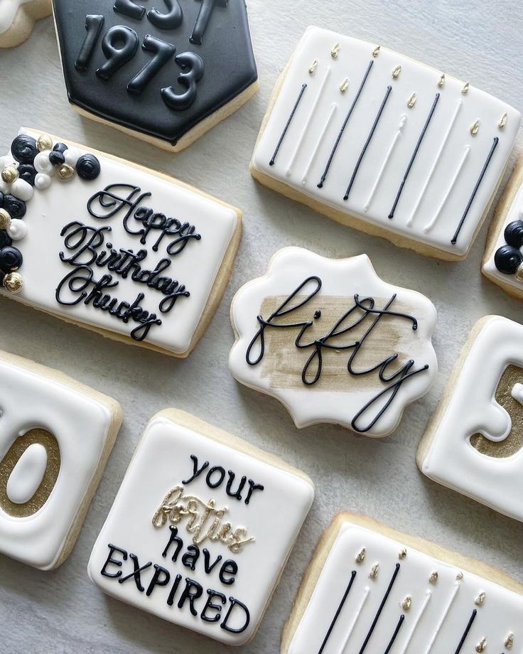 Elegant and Playful Decorative Birthday Cookies with Black and Gold Accents.