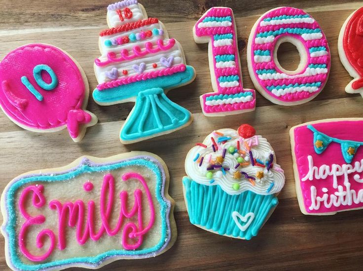 Vibrant Birthday-Themed Cookie Designs with Festive Shapes and Icing