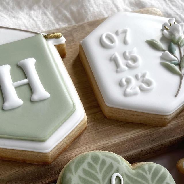 Charming Pastel Cookie Designs: A Sophisticated Inspiration for Minimalist Nail Art.