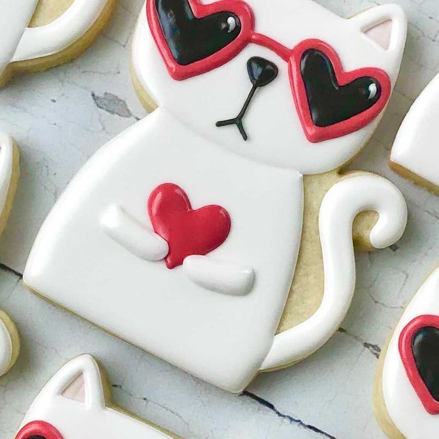 Playful Cat-Shaped Cookies Inspire Whimsical Nail Art Design.