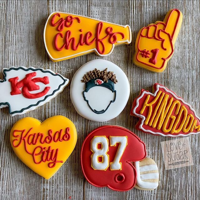 Vibrant Football-Themed Cookies: Team Logos, City Hearts, and Foam Finger Designs for Game Day Celebrations.