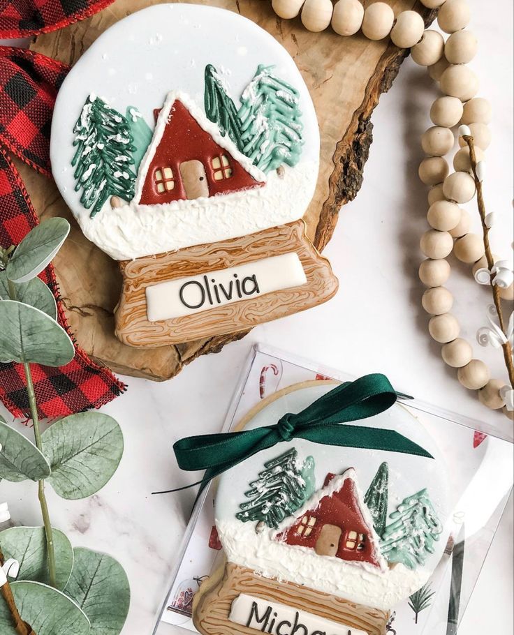 Charming Winter Cookie Designs with Cozy Cabins and Intricate Snow Globe Icing