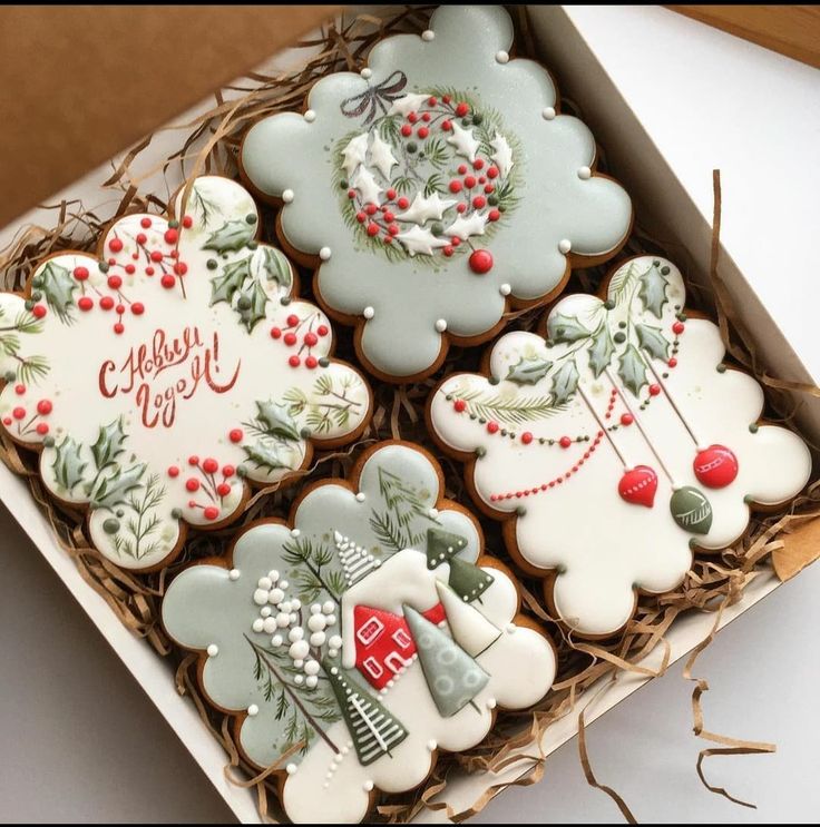 Charming Box of Festively Designed Holiday Cookies in Soft Greens and Whites.