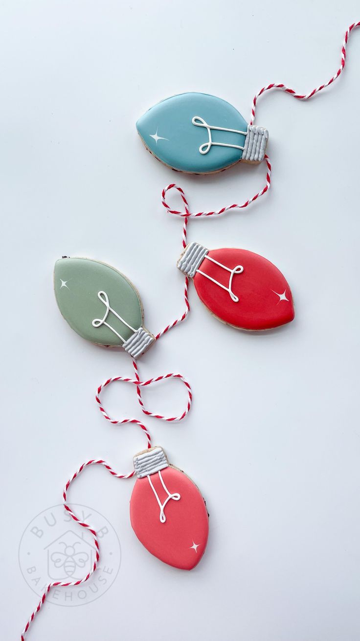 Festive Colorful Holiday Light Bulb Cookies with Charming Twisted String Details