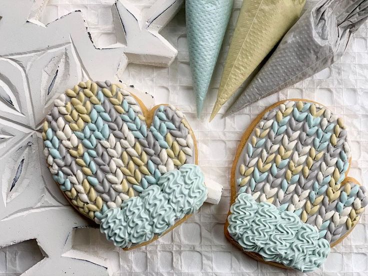 Whimsical Mitten-Shaped Cookies with Intricate Icing for Cozy Winter Celebrations.