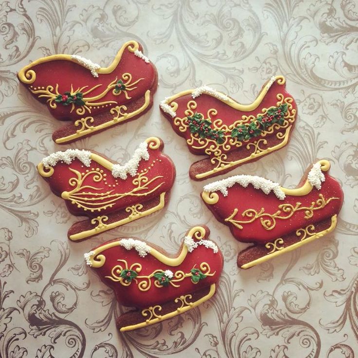 Charming Holiday Cookies: Santa's Sleighs with Festive Frosting and Whimsical Details.