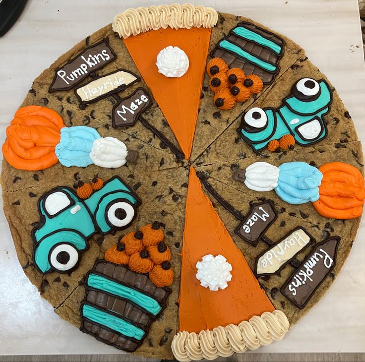 Festive Autumn Cookie Cake Adorned with Seasonal Motifs and Vibrant Colors.