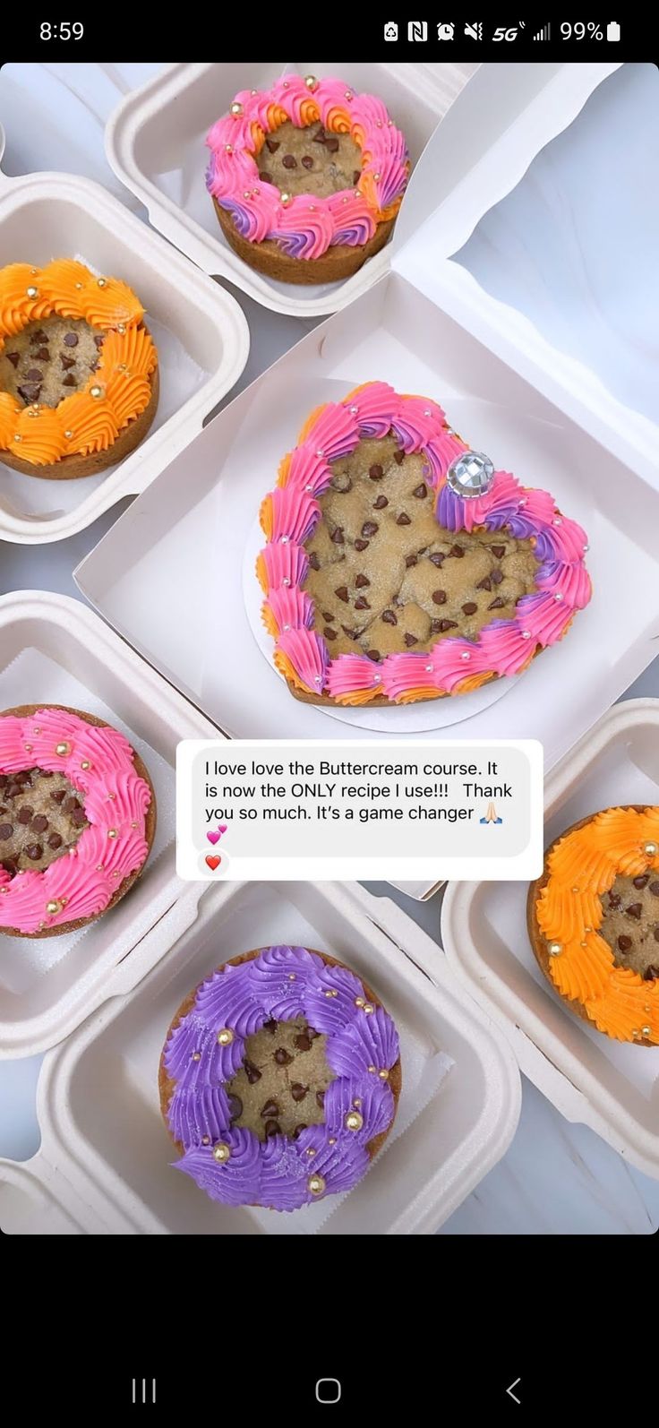 Vibrant Heart-Shaped Cookies with Colorful Buttercream and Chocolate Chip Accents.