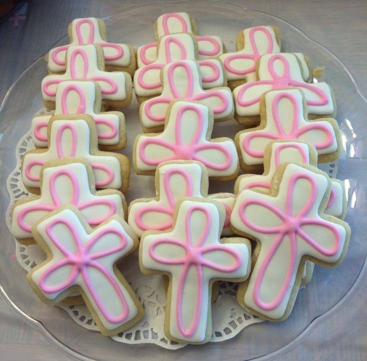 Elegant Cross-Shaped Cookies with Icing and Pink Piping for Themed Celebrations