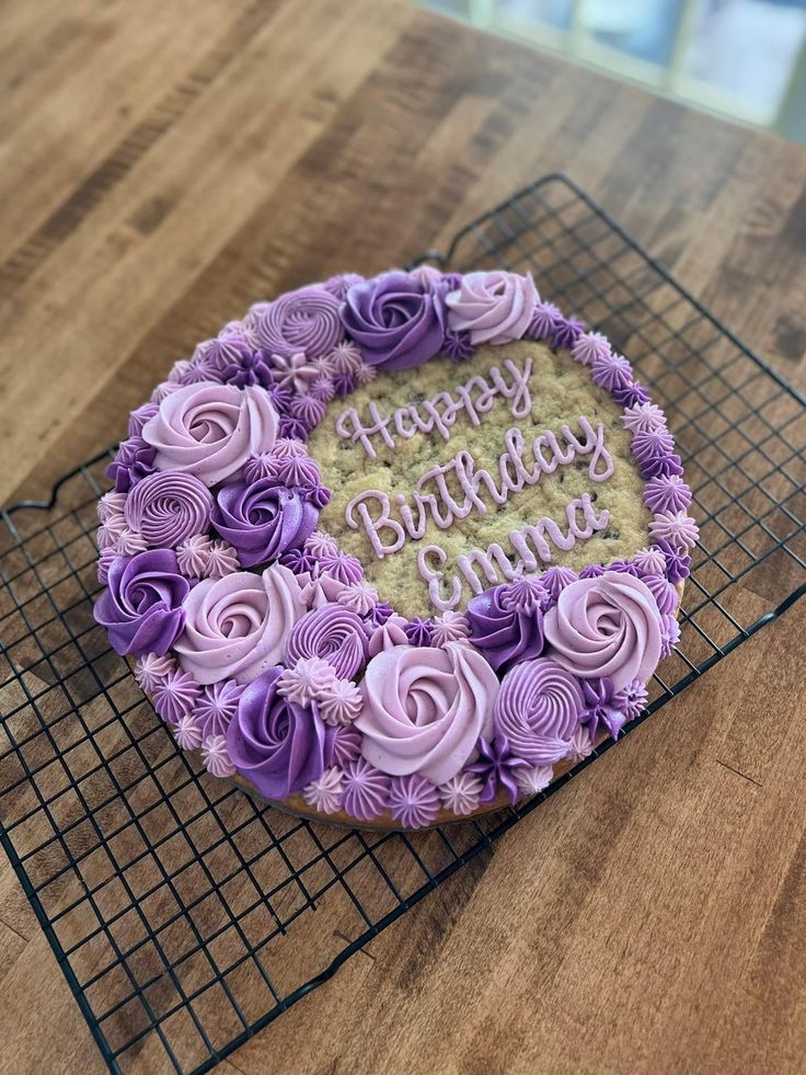 Beautiful Birthday Cake with Intricate Purple Icing Floral Design