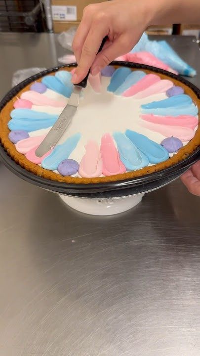 Colorful Pastel Frosting Design on a Round Dessert