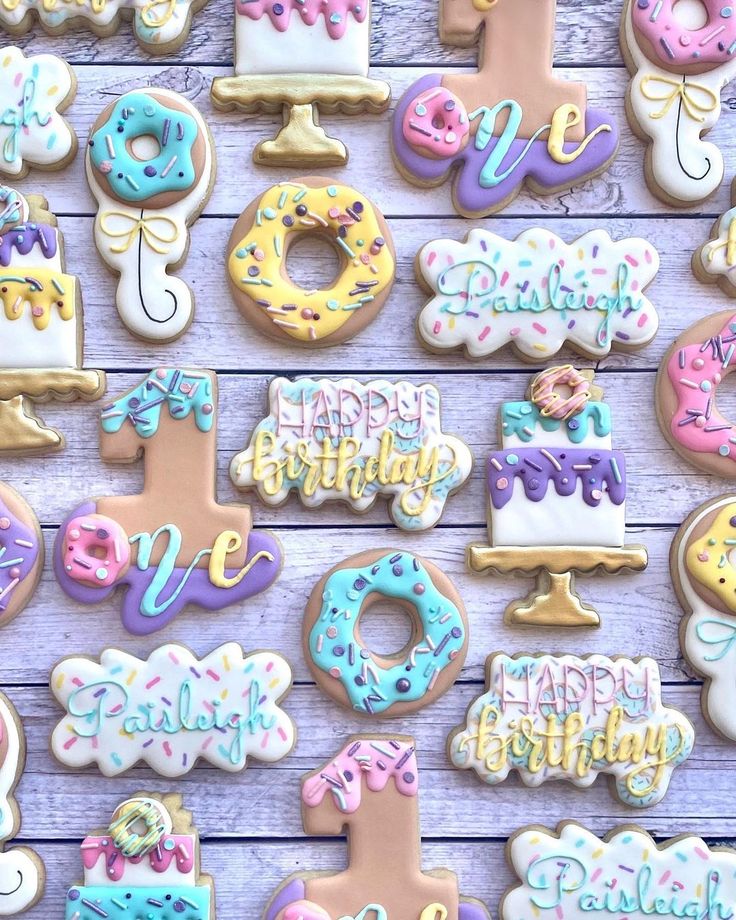 Delightful Whimsical Birthday Cookies: Festive Pastel Designs with Elegant Icing.