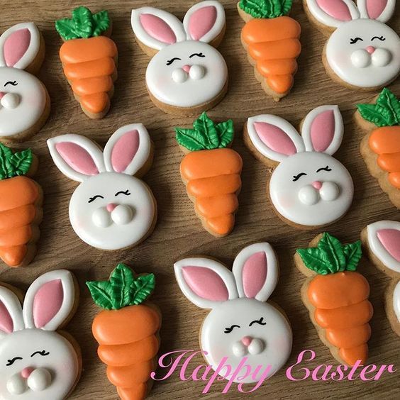 Festive Colorful Easter Cookies with Cheerful Bunny Faces and Vibrant Carrots.