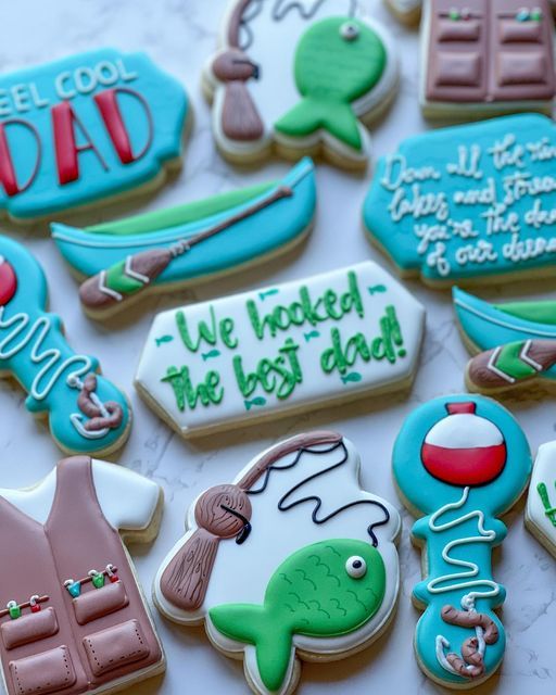 Festive Fishing-Themed Cookies: A Colorful Assortment of Playful Designs and Intricate Icing.