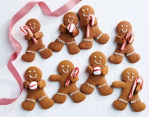 Whimsical Holiday Display of Festively Decorated Gingerbread Figures.