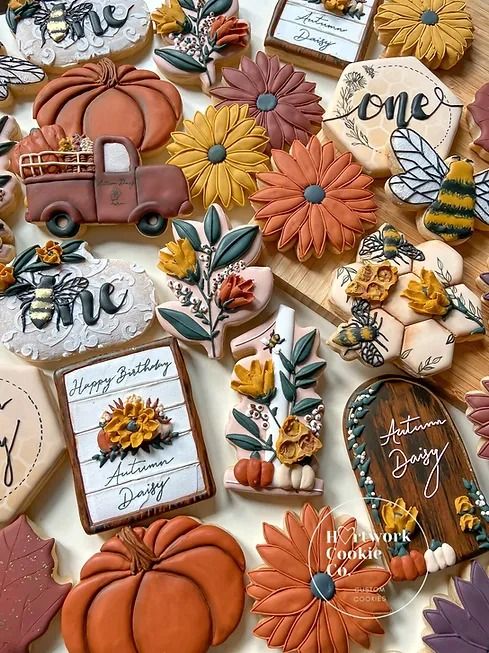 Vibrant Autumn Cookie Designs with Floral Patterns and Seasonal Elements