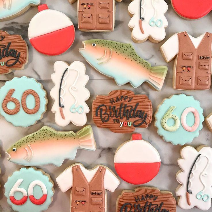 Visually Stunning Fishing-Themed Birthday Cookies in Pastel Colors.