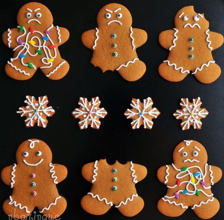 Playfully Designed Gingerbread Cookies with Icing and Festive Snowflake Accents.