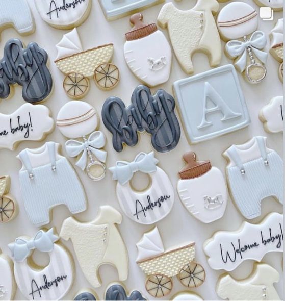 Charming Baby-Themed Decorative Cookies in Soft Pastel Colors