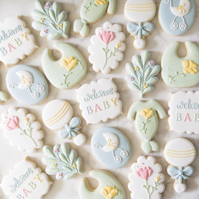 Delightful Pastel Baby Shower Cookies with Whimsical Designs.