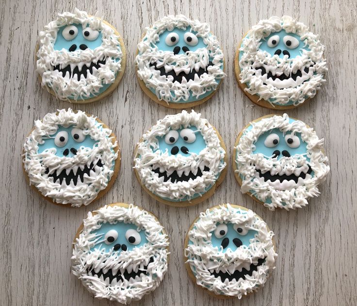 Festively Whimsical Frosty Character Cookies with Blue and White Icing