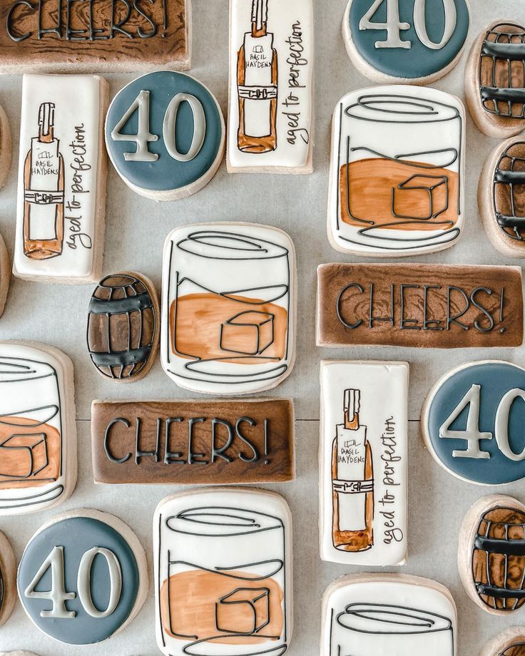 Whiskey-Themed Artisan Cookies: Delightful Designs and Charming Illustrations for Celebrations.