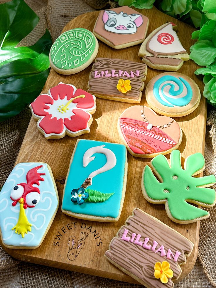 Tropical-Inspired Colorful Cookie Designs: A Festive Fusion of Florals, Ocean Motifs, and Nail Art Inspiration.