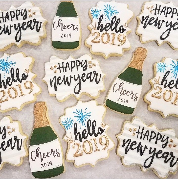 New Year-Themed Decorative Cookies: Celebrate with Festive Designs and Cheerful Greetings.