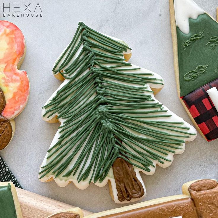 Holiday Cheer: Festive Tree-Shaped Cookie with Green Icing and Chocolate Trunk