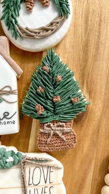 Whimsical Christmas Tree Gingerbread Cookie Design with Green Icing and Pine Cone Ornaments.