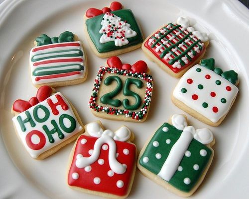 Whimsical Holiday-Themed Festive Cookies in Red, Green, and White with Intricate Icing Designs.