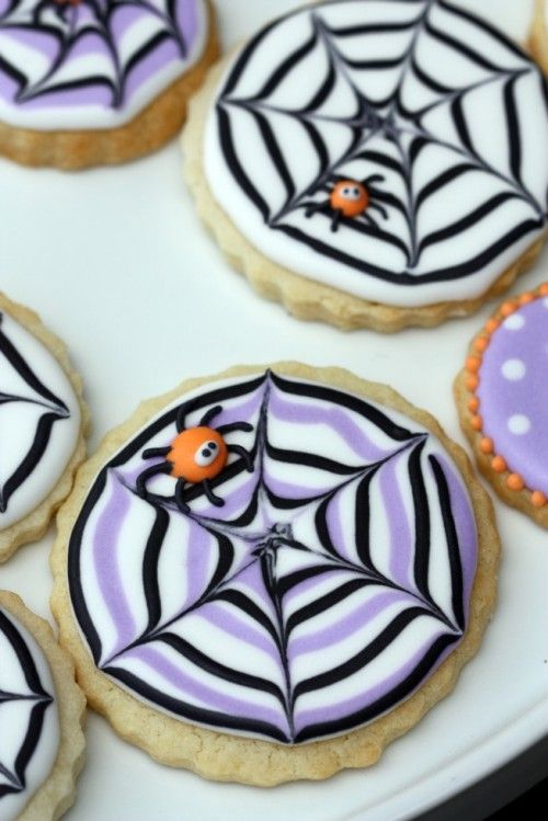 Intricate Spider-Themed Cookies Enhance Halloween Celebrations.