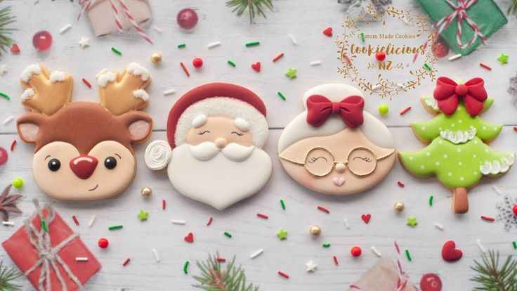 Whimsical Festive Cookie Designs with Reindeer, Santa, and Elf Enhance Holiday Spirit.