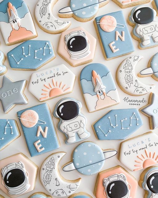 Delightful Space-Themed Colorful Cookies with Playful Designs and Artistic Shapes.