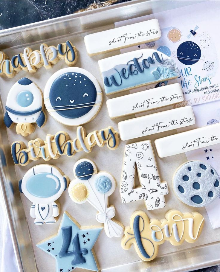 Whimsical Outer Space-Themed Cookie Assortment for Birthday Celebrations.