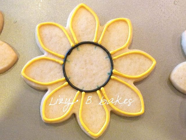 Vibrant Flower-Shaped Cookie Design with Bold Yellow Outlines for Celebrations.