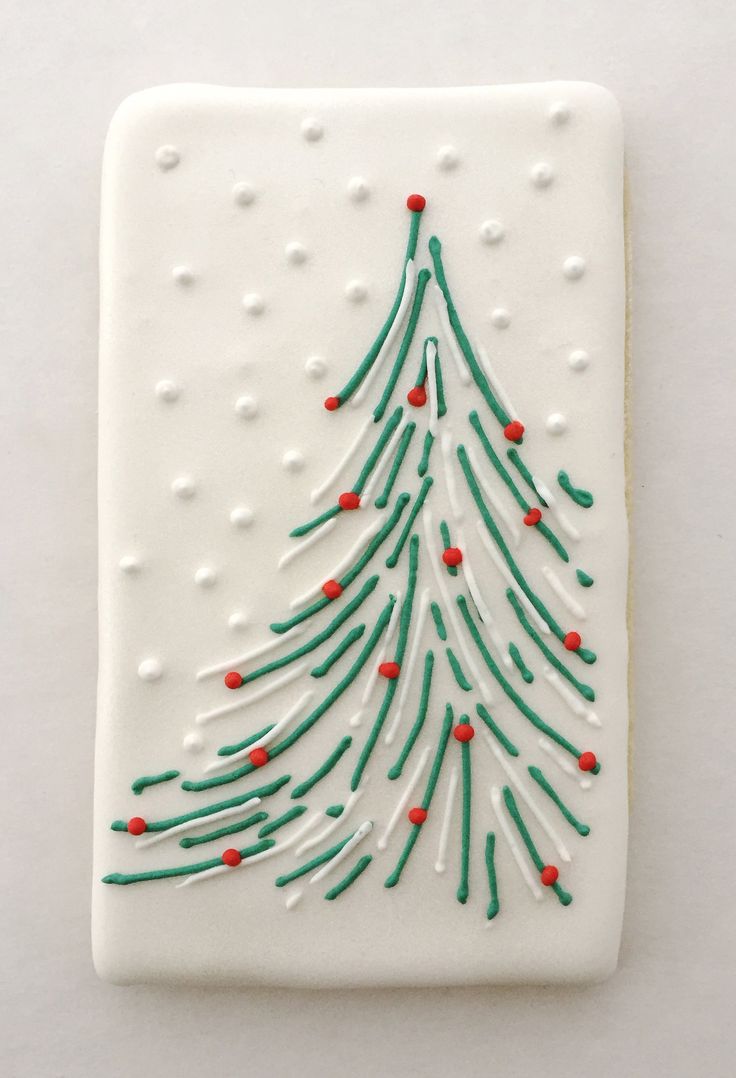 Festive Christmas Tree Cookie Design with Green Icing and Red Ornament Accents.