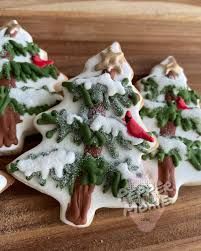 Charming Christmas Tree Cookies: Festively Iced Delights Embodying Holiday Spirit.